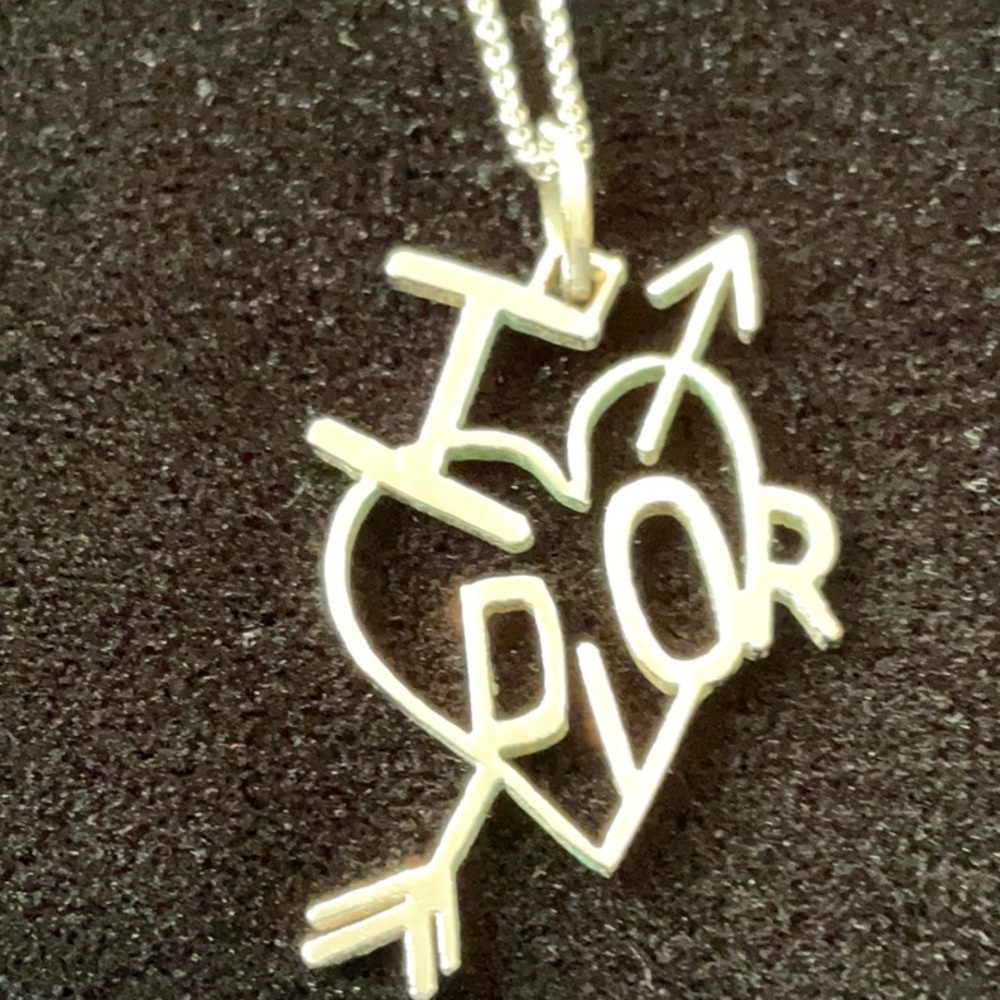 Repurposed Dior earring, perfect condition on a 925 Sterling chain.